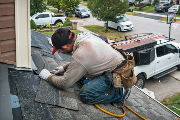 Professional Roof Replacement technician working in Deerfield, MI
